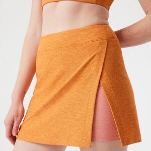 Outdoor Voices Court Skort in Canyon / Nectarine